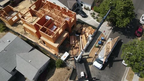Crane in front of house under construction Stock-Footage 228794819