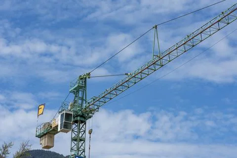 Crane for heavy lifting Working Construction Site in Europe. Stock Photos
