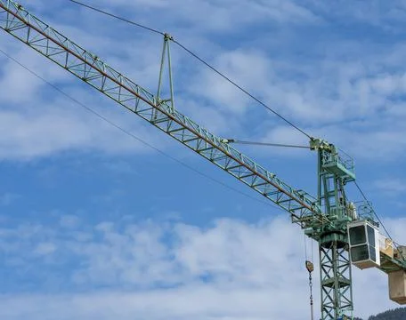 Crane for heavy lifting Working Construction Site in Europe. Stock Photos
