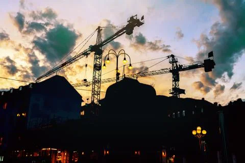 Crane for heavy lifting Working Construction Site in Europe. Stock Photos
