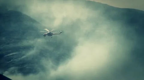 Crane Helicopter Dumping Water on Fire Stock Footage 11259804
