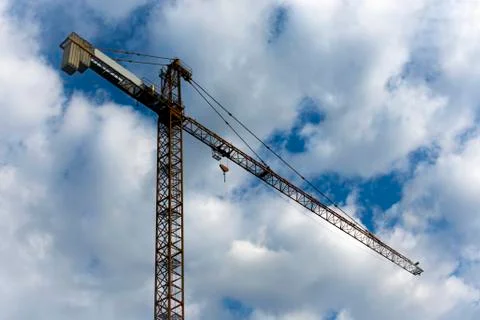 Crane high on sky Stock Photos