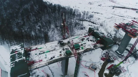 Crane hoist over bridge section at highway construction site Stock Footage 237332804