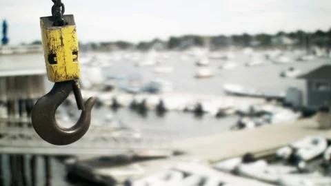 Crane Hook against a soft focus marina bay in the background 库存影片 116666288