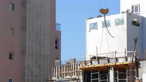 Crane hook chain at skyscraper construct... | Stock Video | Pond5