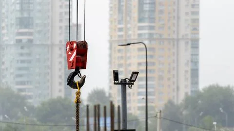 Crane hook close-up. Building area, construction of houses, developer 스톡 사진