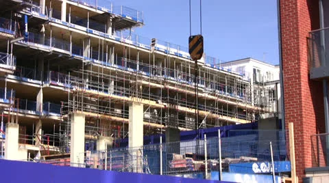 Crane hook with scaffolding in background Stock Footage 22795205