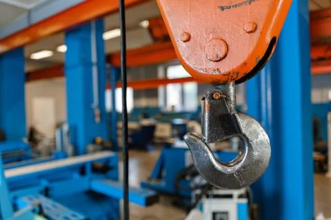 Crane hook. The system of pulleys and ropes, a hanging mechanism in the Stock Photos