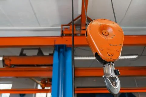 Crane hook. The system of pulleys and ropes, a hanging mechanism in the Stock Photos