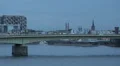Crane Houses Modern Tramway Crossing Bridge Rush Hour Cologne Dusk Evening Night HD Footage
