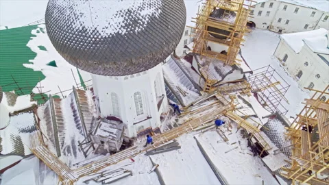 Crane installing an onion dome on a Russian orthodox church Stock Footage 337061764