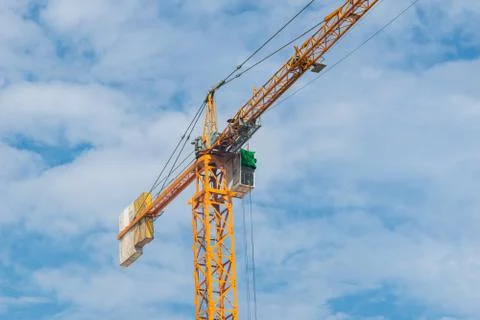 Crane isolate on blue sky Stock Photos