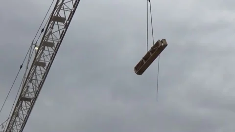 Crane Lifting Beams Close Up Stock Footage