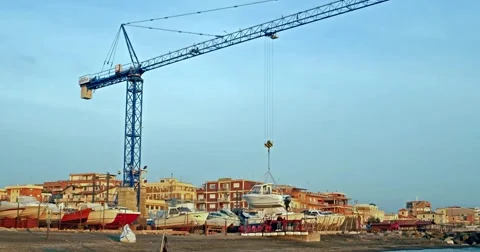 Crane lifting a boat  Stock Footage 68193889