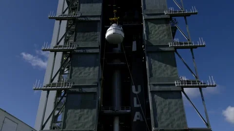 Crane lifting Boeing OFT-2 Starliner spacecraft at Vertical Integration Facility Stock Footage 274264836