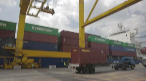 Crane Lifting Cargo Container Stock Footage 65309331