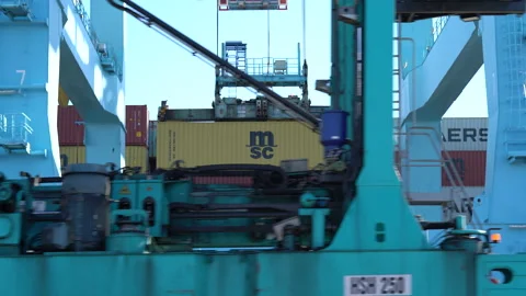 Crane lifting cargo container Video stock 171590874