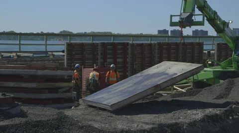 Crane lifting concrete walll Stock Footage 65052812