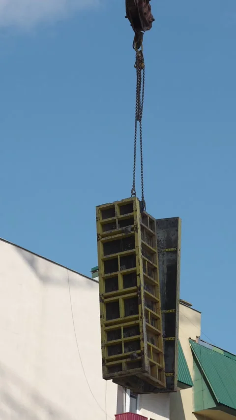 Crane lifting construction bucket Stock Footage 326794313