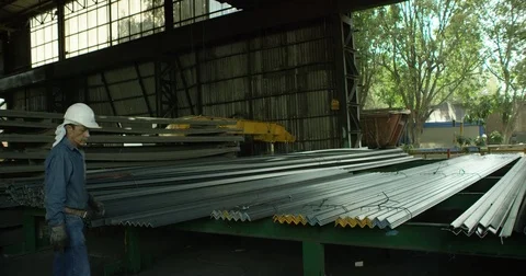 Crane lifting metals Stock Footage 81007034