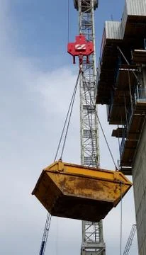Crane Lifting Skip Dumpster Stock Photos