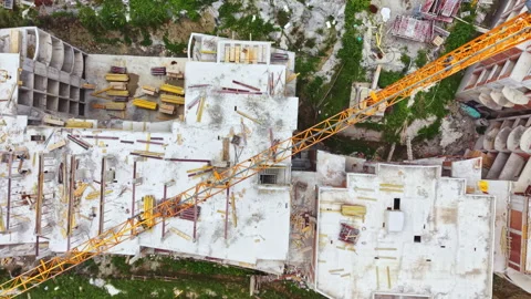 Crane lifting work. Crane operation with workers coordinating safe heavy lift. Video stock 337884596
