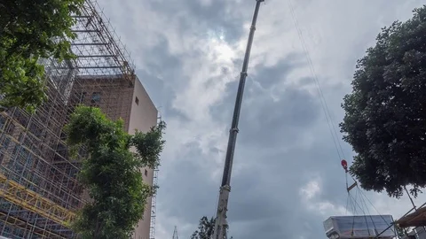 Crane Lifts Construction Materials Time Lapse Stock Footage 72492725