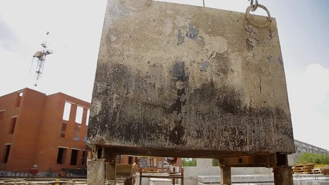 Crane lifts heavy load on construction site Stock Footage 101631751