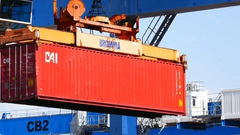 Crane lifts a large cargo container 4k Video stock 92142830