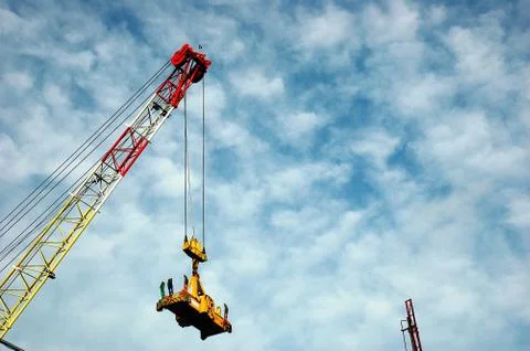 Crane loading container Stock Photos