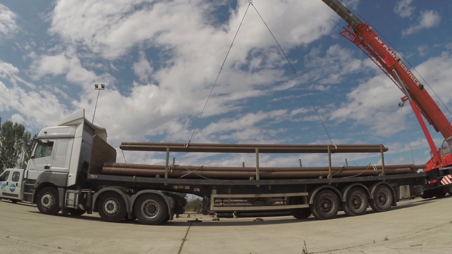 crane-loading-offshore-pipes-flatbed-084302452_prevstill.jpeg