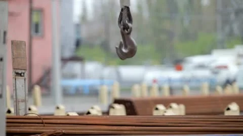 Crane loading rebar on the construction site Stock Footage 21905009