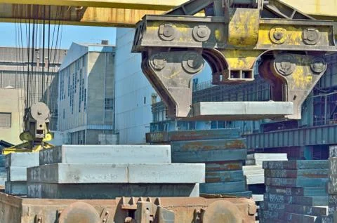 Crane loading sheet steel Stock Photos