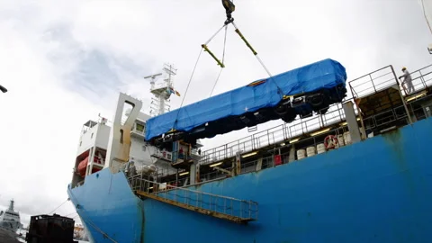 Crane Lowering Train Carriage Car From Bulk Cargo Ship Stock Footage 248531721