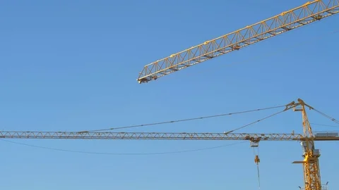 Crane machine work in sunny day against blue sky 스톡 동영상 84025210