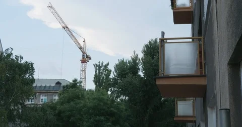 A crane in the middle of a city Stock Footage 100647775