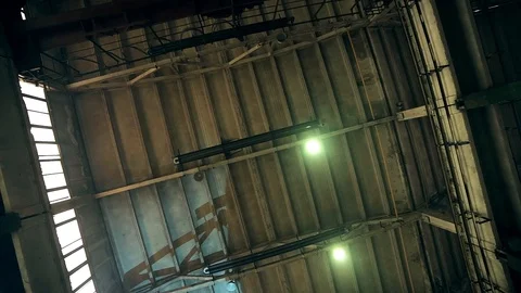 The crane moves above the warehouse Видео 91074358