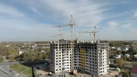 Crane moves construction materials at a construction site. Stock Footage 97119082