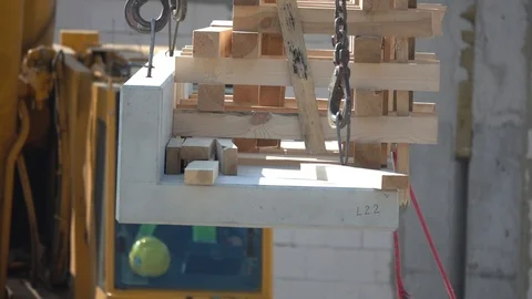 The crane moves the load on the construction site, closeup, 250 fps HD, slomo Stock Footage 107200930