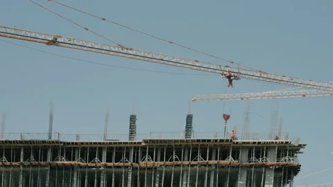 The crane moves the material, people control Stock Footage 170332823