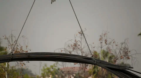 Crane moves metal elements to the construction site Video stock 34524525