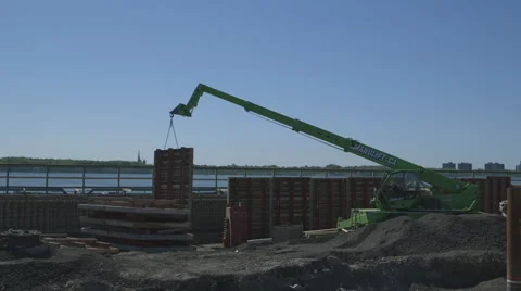 Crane moving concrete wall Stock Footage 65052538