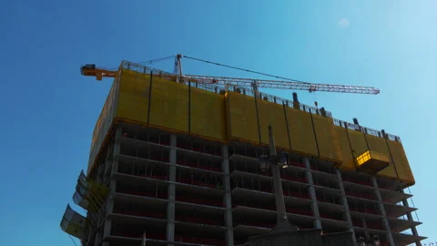 Crane Moving at a Construction Site Stock-Footage 240511877