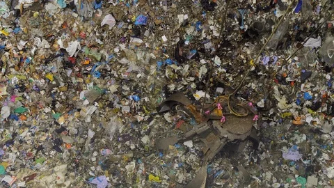 Crane moving Garbage in an Industrial Dumpster. Waste Recycling Plant  Stock Footage 109844368