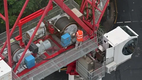 Crane operator fixing lift cable Stock Footage 304401826