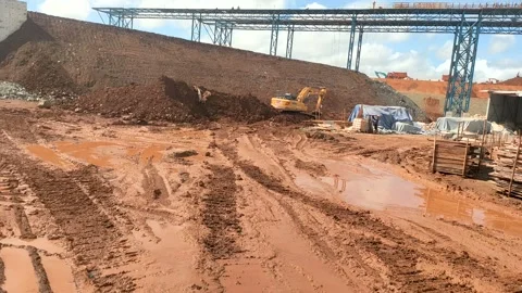 Crane Operator POV Over Active Earthmoving and Mining Operations Stock Footage 340236864