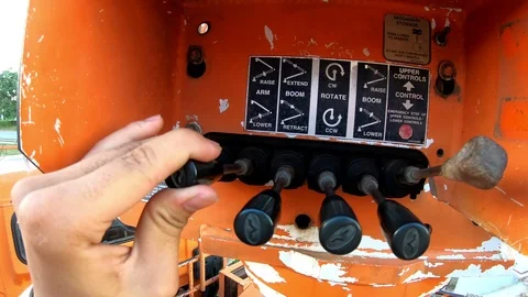 Crane Operator. A worker hand with Lorry Crane control.out door. Stock Footage 118130914