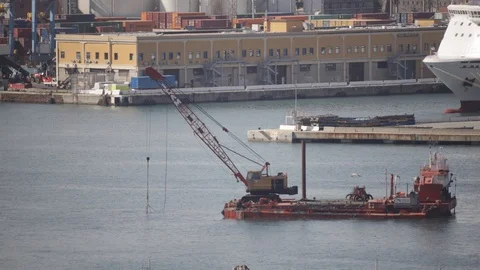 Crane on pontoon which dredges the seabed of the port 03 Stock Footage 126287279
