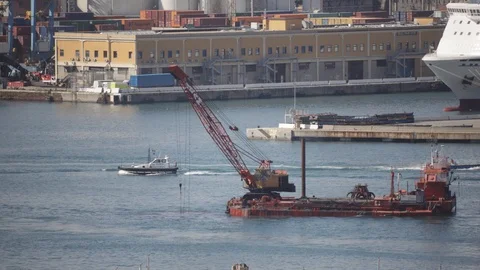 Crane on pontoon which dredges the seabed of the port 01 Stock-Footage 126288337
