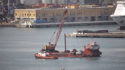 Crane on pontoon which dredges the seabed of the port 05 Stock Footage 126293753